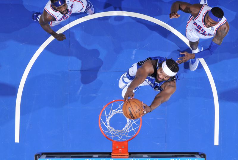 ORLANDO, FL - JANUARY 19: Wendell Carter Jr. #34 of the Orlando Magic dunks the ball during the game against the Philadelphia 76ers on January 19, 2024 at the Kia Center in Orlando, Florida. NOTE TO USER: User expressly acknowledges and agrees that, by downloading and or using this photograph, User is consenting to the terms and conditions of the Getty Images License Agreement. Mandatory Copyright Notice: Copyright 2024 NBAE (Photo by Fernando Medina/NBAE via Getty Images)