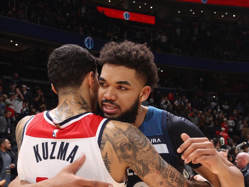 WASHINGTON, DC -? JANUARY 24: Kyle Kuzma #33 of the Washington Wizards embraces Karl-Anthony Towns #32 of the Minnesota Timberwolves after the game on January 24, 2024 at Capital One Arena in Washington, DC. NOTE TO USER: User expressly acknowledges and agrees that, by downloading and or using this Photograph, user is consenting to the terms and conditions of the Getty Images License Agreement. Mandatory Copyright Notice: Copyright 2024 NBAE (Photo by Stephen Gosling/NBAE via Getty Images)