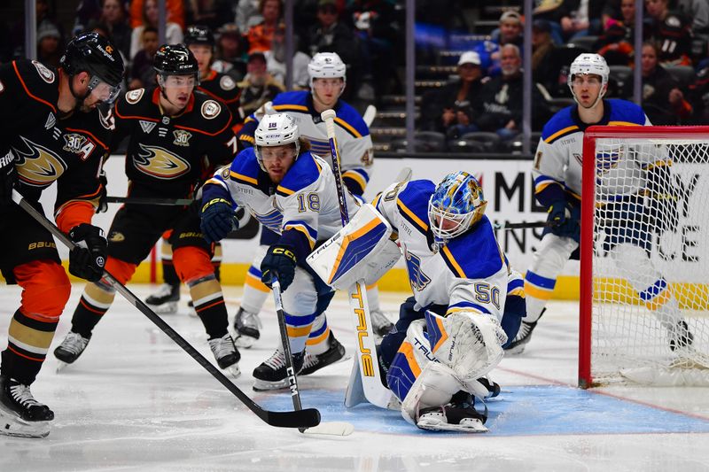 Apr 7, 2024; Anaheim, California, USA; Anaheim Ducks left wing Alex Killorn (17) moves in for a shot against St. Louis Blues goaltender Jordan Binnington (50) during the second period at Honda Center. Mandatory Credit: Gary A. Vasquez-USA TODAY Sports