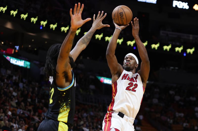 MIAMI, FLORIDA - DECEMBER 02: Jimmy Butler #22 of the Miami Heat shoots the ball against the Indiana Pacers during the first quarter of the game at Kaseya Center on December 02, 2023 in Miami, Florida. NOTE TO USER: User expressly acknowledges and agrees that, by downloading and or using this photograph, User is consenting to the terms and conditions of the Getty Images License Agreement. (Photo by Megan Briggs/Getty Images)