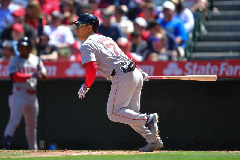 Apr 7, 2024; Anaheim, California, USA; Boston Red Sox designated hitter Masataka Yoshida (7) hits against the Los Angeles Angels during the fourth inning at Angel Stadium. Mandatory Credit: Gary A. Vasquez-USA TODAY Sports