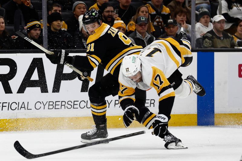 Nov 29, 2024; Boston, Massachusetts, USA; Boston Bruins defenseman Nikita Zadorov (91) checks Pittsburgh Penguins right wing Bryan Rust (17) during the second period at TD Garden. Mandatory Credit: Winslow Townson-Imagn Images