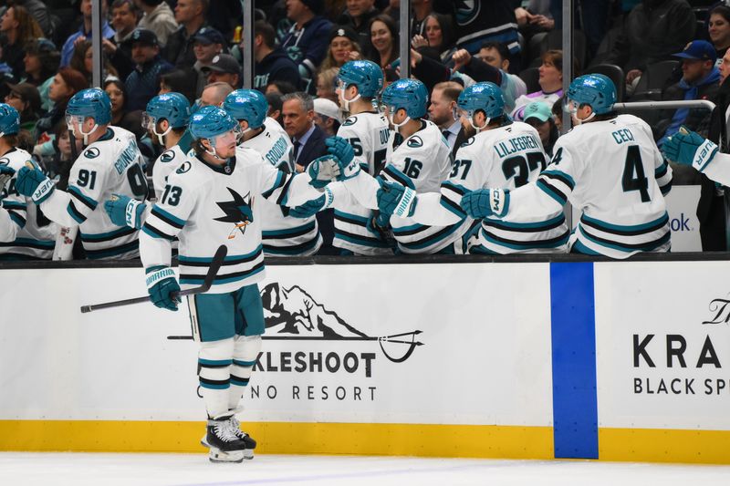Jan 30, 2025; Seattle, Washington, USA; San Jose Sharks center Tyler Toffoli (73) celebrates with the bench after scoring a goal against the Seattle Kraken during the third period at Climate Pledge Arena. Mandatory Credit: Steven Bisig-Imagn Images