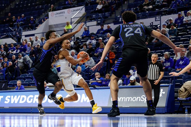 Jan 13, 2024; Colorado Springs, Colorado, USA; San Jose State Spartans guard Myron Amey Jr. (0) controls the ball under pressure from Air Force Falcons guard Ethan Taylor (5) and guard Jeffrey Mills (24) in the first half at Clune Arena. Mandatory Credit: Isaiah J. Downing-USA TODAY Sports