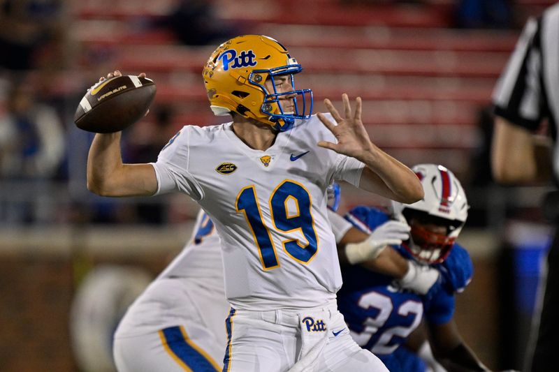 Nov 2, 2024; Dallas, Texas, USA; Pittsburgh Panthers quarterback Nate Yarnell (19) passes against the Southern Methodist Mustangs during the second half at Gerald J. Ford Stadium. Mandatory Credit: Jerome Miron-Imagn Images