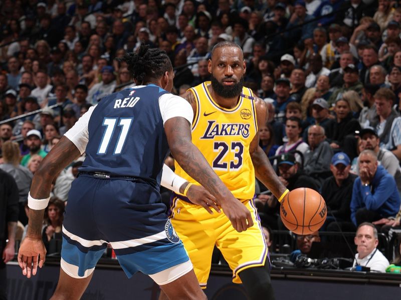 MINNEAPOLIS, MN -  APRIL 25:  LeBron James #23 of the Los Angeles Lakers dribbles the ball during the game against the Minnesota Timberwolves    during Round 1 Game 3 of the 2025 NBA Playoffs  on April 25, 2025 at Target Center in Minneapolis, Minnesota. NOTE TO USER: User expressly acknowledges and agrees that, by downloading and or using this Photograph, user is consenting to the terms and conditions of the Getty Images License Agreement. Mandatory Copyright Notice: Copyright 2025 NBAE (Photo by David Sherman/NBAE via Getty Images)