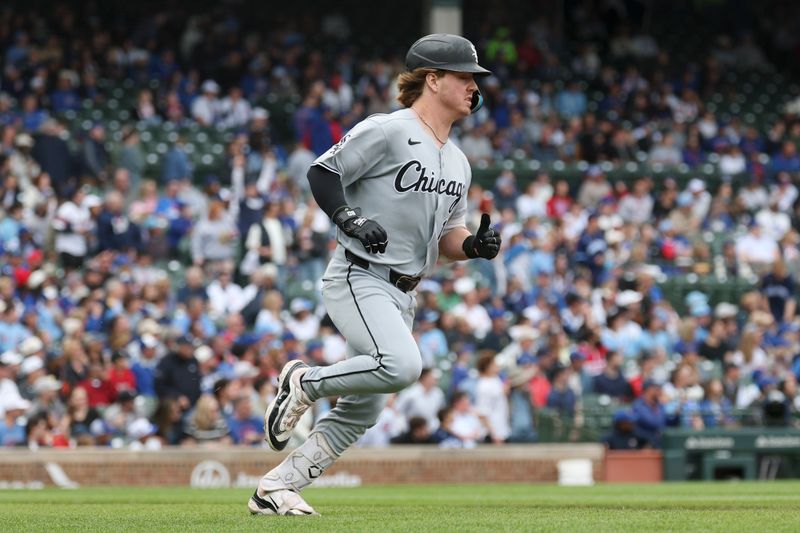 May 17, 2025; Chicago, Illinois, USA; Chicago White Sox shortstop Chase Meidroth (10) rounds the bases after hitting a solo home run against the Chicago Cubs during the first inning at Wrigley Field. Mandatory Credit: Kamil Krzaczynski-Imagn Images