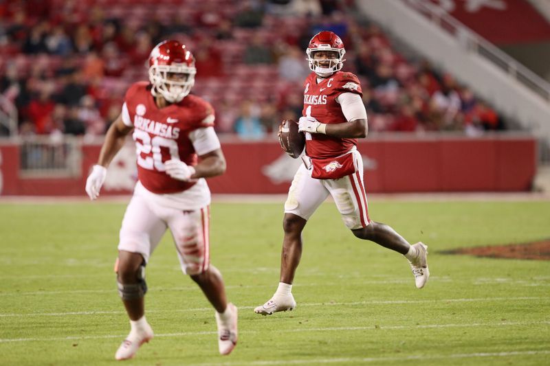 Nov 18, 2023; Fayetteville, Arkansas, USA; Arkansas Razorbacks quarterback KJ Jefferson (1) looks to pass as running back Dominique Johnson (20) protects during the second half against the FIU Panthers at Donald W. Reynolds Razorback Stadium. Arkansas won 44-20. Mandatory Credit: Nelson Chenault-USA TODAY Sports