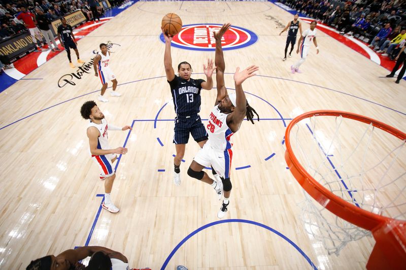 DETROIT, MI - January 01:  Jett Howard #13 of the Orlando Magic shoots the ball during the game against the Detroit Pistons on January 01, 2025 at Little Caesars Arena in Detroit, Michigan. NOTE TO USER: User expressly acknowledges and agrees that, by downloading and/or using this photograph, User is consenting to the terms and conditions of the Getty Images License Agreement. Mandatory Copyright Notice: Copyright 2025 NBAE (Photo by Brian Sevald/NBAE via Getty Images)