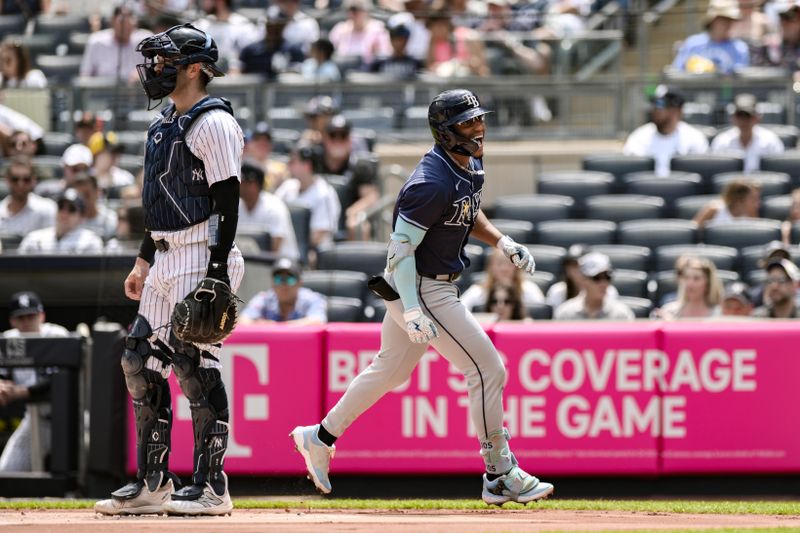 Jul 21, 2024; Bronx, New York, USA; Tampa Bay Rays outfielder Richie Palacios (1) crosses home plate after hitting a solo home run against the New York Yankees during the first inning at Yankee Stadium. Mandatory Credit: John Jones-USA TODAY Sports