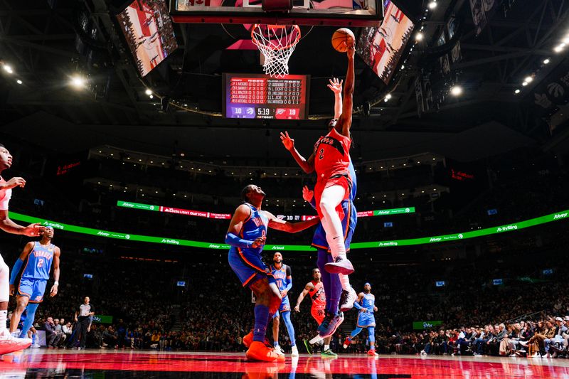 TORONTO, CANADA - DECEMBER 05:  Jonathan Mogbo #2 of the Toronto Raptors shoots the ball during the game against the Oklahoma City Thunderon December 05, 2024 at the Scotiabank Arena in Toronto, Ontario, Canada.  NOTE TO USER: User expressly acknowledges and agrees that, by downloading and or using this Photograph, user is consenting to the terms and conditions of the Getty Images License Agreement.  Mandatory Copyright Notice: Copyright 2024 NBAE (Photo by Mark Blinch/NBAE via Getty Images)