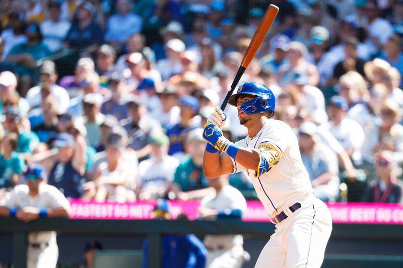 Aug 13, 2023; Seattle, Washington, USA; Seattle Mariners center fielder Julio Rodriguez (44) hits an RBI-double against the Baltimore Orioles during the fifth inning at T-Mobile Park. Mandatory Credit: Joe Nicholson-USA TODAY Sports