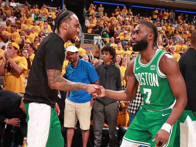 INDIANAPOLIS, IN - MAY 25: Oshae Brissett #12 and Jaylen Brown #7 of the Boston Celtics shake hands before the game against the Indiana Pacers during Game 3 of the Eastern Conference Finals of the 2024 NBA Playoffs on May 25, 2024 at Gainbridge Fieldhouse in Indianapolis, Indiana. NOTE TO USER: User expressly acknowledges and agrees that, by downloading and or using this Photograph, user is consenting to the terms and conditions of the Getty Images License Agreement. Mandatory Copyright Notice: Copyright 2024 NBAE (Photo by Nathaniel S. Butler/NBAE via Getty Images)