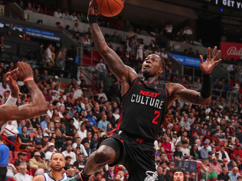 MIAMI, FL - MARCH 26:  Terry Rozier #2 of the Miami Heat shoots the ball during the game against the Golden State Warriors on March 26, 2024 at Kaseya Center in Miami, Florida. NOTE TO USER: User expressly acknowledges and agrees that, by downloading and or using this Photograph, user is consenting to the terms and conditions of the Getty Images License Agreement. Mandatory Copyright Notice: Copyright 2024 NBAE (Photo by Issac Baldizon/NBAE via Getty Images)