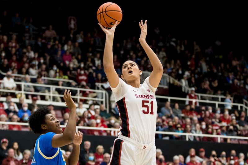 Feb 20, 2023; Stanford, California, USA;  Stanford Cardinal center Lauren Betts (51) shoots in front of UCLA Bruins forward Christeen Iwuala (22) during the first half at Maples Pavilion. Mandatory Credit: John Hefti-USA TODAY Sports