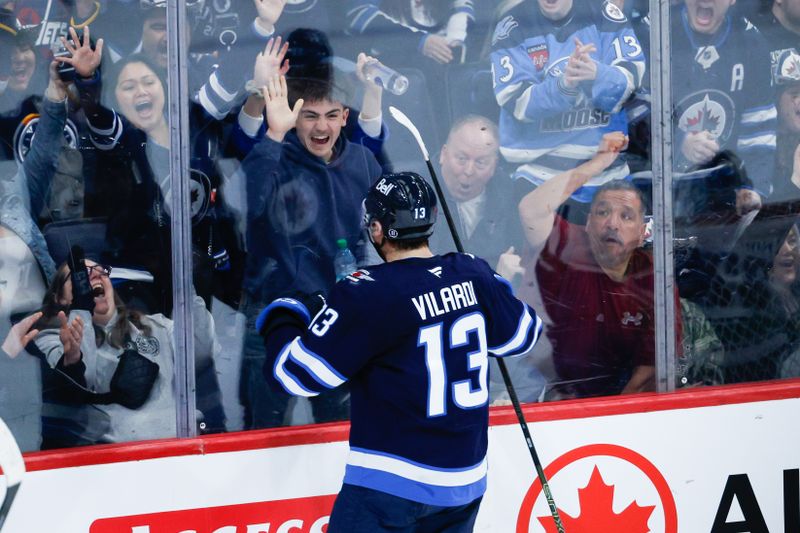 Mar 7, 2026; Winnipeg, Manitoba, CAN;  Winnipeg Jets forward Gabriel Vilardi (13) celebrates his goal against the Vancouver Canucks during the third period at Canada Life Centre. Mandatory Credit: Terrence Lee-Imagn Images