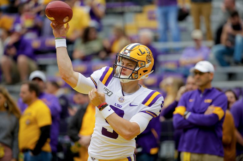 Oct 26, 2019; Baton Rouge, LA, USA; LSU Tigers quarterback Joe Burrow (9) warms up prior to kickoff against the Auburn Tigers at Tiger Stadium. Mandatory Credit: Derick E. Hingle-USA TODAY Sports