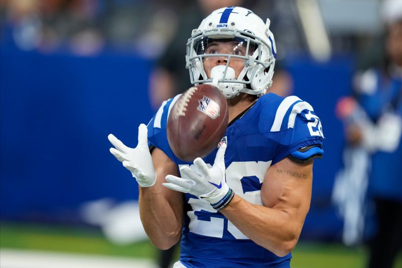 Indianapolis Colts running back Evan Hull (26) warms up before playing against the Denver Broncos in a preseason NFL football game, Sunday, Aug. 11, 2024, in Westfield, Ind. (AP Photo/Darron Cummings)