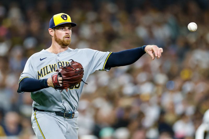 Sep 23, 2025; San Diego, California, USA; Milwaukee Brewers starting pitcher Bruce Zimmermann (55) throws to first for an out during the third inning against the San Diego Padres at Petco Park. Mandatory Credit: David Frerker-Imagn Images