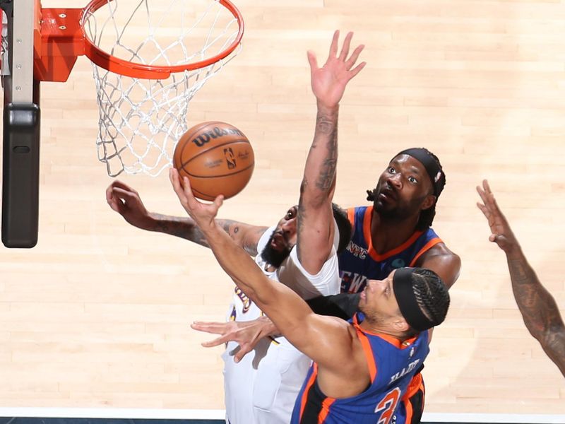 NEW YORK, NY - FEBRUARY 3: Anthony Davis #3 of the Los Angeles Lakers blocks the shot by Josh Hart #3 of the New York Knicks during the game on February 3, 2024 at Madison Square Garden in New York City, New York.  NOTE TO USER: User expressly acknowledges and agrees that, by downloading and or using this photograph, User is consenting to the terms and conditions of the Getty Images License Agreement. Mandatory Copyright Notice: Copyright 2024 NBAE  (Photo by Nathaniel S. Butler/NBAE via Getty Images)