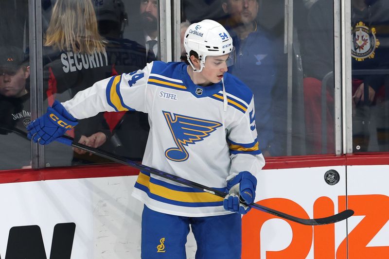 Mar 15, 2026; Winnipeg, Manitoba, CAN; St. Louis Blues right wing Dalibor Dvorsky (54) puck juggles before a game against the Winnipeg Jets at Canada Life Centre. Mandatory Credit: James Carey Lauder-Imagn Images