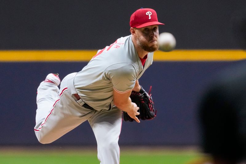 Sep 17, 2024; Milwaukee, Wisconsin, USA;  Philadelphia Phillies pitcher Zack Wheeler (45) throws a pitch during the first inning against the Milwaukee Brewers at American Family Field. Mandatory Credit: Jeff Hanisch-Imagn Images
