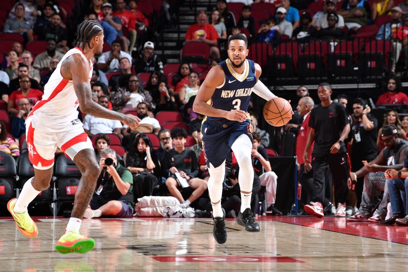 HOUSTON, TX - OCTOBER 15: CJ McCollum #3 of the New Orleans Pelicans dribbles the ball during the game against the Houston Rockets during a NBA preseason game on October 15, 2024 at the Toyota Center in Houston, Texas. NOTE TO USER: User expressly acknowledges and agrees that, by downloading and or using this photograph, User is consenting to the terms and conditions of the Getty Images License Agreement. Mandatory Copyright Notice: Copyright 2024 NBAE (Photo by Logan Riely/NBAE via Getty Images)