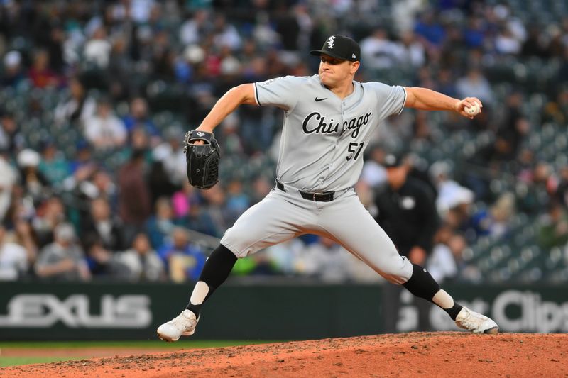 Jun 11, 2024; Seattle, Washington, USA; Chicago White Sox relief pitcher Jared Shuster (51) pitches to the Seattle Mariners during the seventh inning at T-Mobile Park. Mandatory Credit: Steven Bisig-USA TODAY Sports