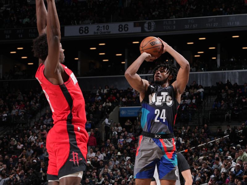 BROOKLYN, NY - JANUARY 27: Cam Thomas #24 of the Brooklyn Nets shoots a three point basket against the Houston Rockets on January 27, 2024 at Barclays Center in Brooklyn, New York. NOTE TO USER: User expressly acknowledges and agrees that, by downloading and or using this Photograph, user is consenting to the terms and conditions of the Getty Images License Agreement. Mandatory Copyright Notice: Copyright 2024 NBAE (Photo by Jesse D. Garrabrant/NBAE via Getty Images)