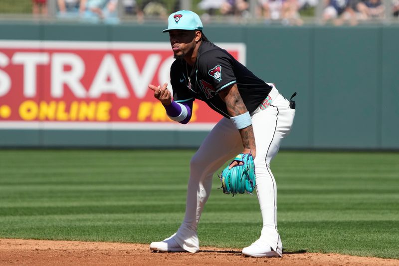 Mar 11, 2024; Salt River Pima-Maricopa, Arizona, USA; Arizona Diamondbacks second baseman Ketel Marte (4) signals the bench against the Oakland Athletics in the third inning at Salt River Fields at Talking Stick. Mandatory Credit: Rick Scuteri-USA TODAY Sports