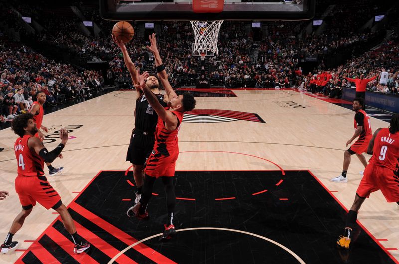 PORTLAND, OR - FEBRUARY 8: Cade Cunningham #2 of the Detroit Pistons shoots the ball during the game against the Portland Trail Blazers on February 8, 2024 at the Moda Center Arena in Portland, Oregon. NOTE TO USER: User expressly acknowledges and agrees that, by downloading and or using this photograph, user is consenting to the terms and conditions of the Getty Images License Agreement. Mandatory Copyright Notice: Copyright 2024 NBAE (Photo by Cameron Browne/NBAE via Getty Images)