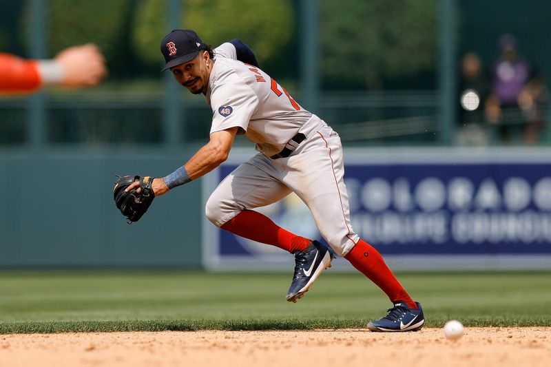 Jul 24, 2024; Denver, Colorado, USA; Boston Red Sox shortstop David Hamilton (70) attempts to run down a hit in the sixth inning against the Colorado Rockies at Coors Field. Mandatory Credit: Isaiah J. Downing-USA TODAY Sports