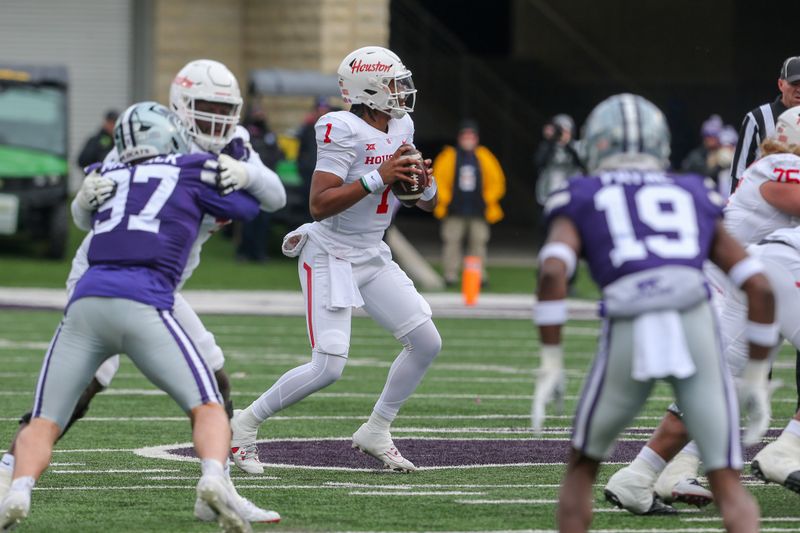 Oct 28, 2023; Manhattan, Kansas, USA; Houston Cougars quarterback Donovan Smith (1) drops back to pass during the first quarter against the Kansas State Wildcats at Bill Snyder Family Football Stadium. Mandatory Credit: Scott Sewell-USA TODAY Sports