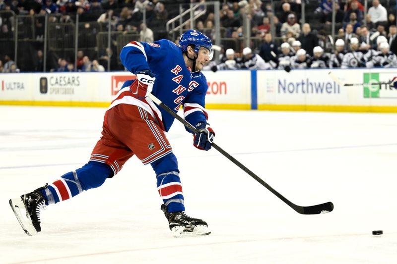 Mar 22, 2026; New York, New York, USA; New York Rangers center J.T. Miller (8) takes a shot on goal against the Winnipeg Jets during the second period at Madison Square Garden. Mandatory Credit: John Jones-Imagn Images