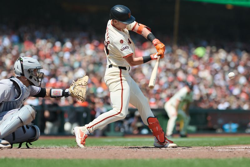 Jul 28, 2024; San Francisco, California, USA; San Francisco Giants outfielder Tyler Fitzgerald (49) hits a single against the Colorado Rockies during the sixth inning at Oracle Park. Mandatory Credit: Robert Edwards-USA TODAY Sports