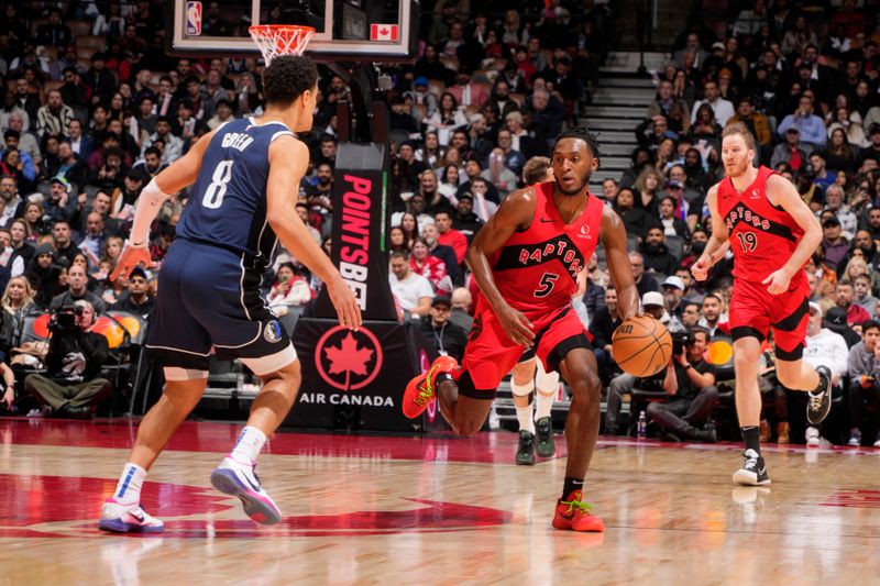 TORONTO, CANADA - FEBRUARY 28: Immanuel Quickley #5 of the Toronto Raptors dribbles the ball during the game against the Dallas Mavericks on February 28, 2024 at the Scotiabank Arena in Toronto, Ontario, Canada.  NOTE TO USER: User expressly acknowledges and agrees that, by downloading and or using this Photograph, user is consenting to the terms and conditions of the Getty Images License Agreement.  Mandatory Copyright Notice: Copyright 2024 NBAE (Photo by Mark Blinch/NBAE via Getty Images)