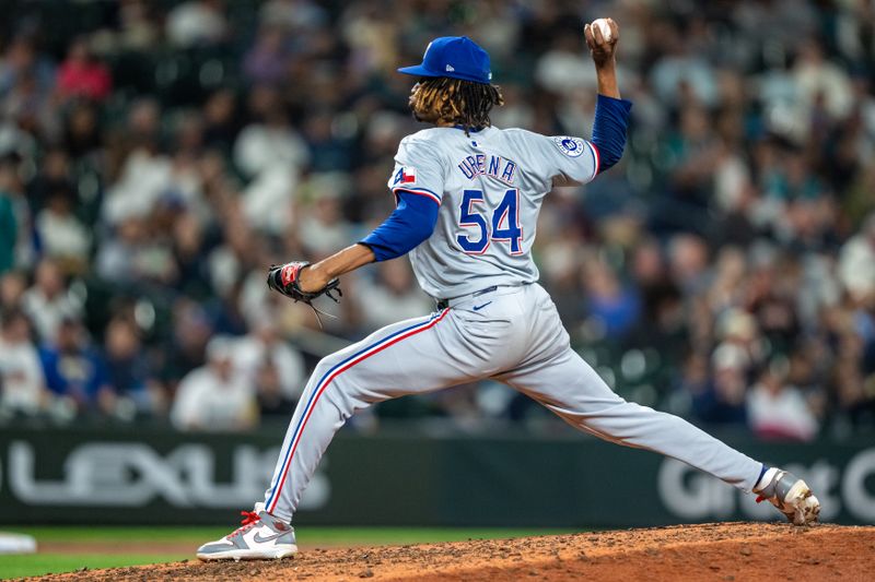 Sep 13, 2024; Seattle, Washington, USA;  Texas Rangers reliever Jose Urena (54) delivers a pitch during the sixth inning against the Seattle Mariners at T-Mobile Park. Mandatory Credit: Stephen Brashear-Imagn Images