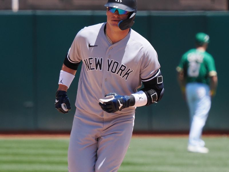 Jun 29, 2023; Oakland, California, USA; New York Yankees third baseman Josh Donaldson (28) rounds the bases on a two-run home run against the Oakland Athletics during the sixth inning at Oakland-Alameda County Coliseum. Mandatory Credit: Kelley L Cox-USA TODAY Sports