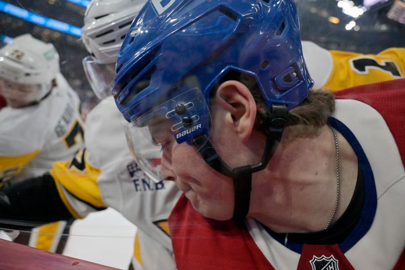 Oct 14, 2024; Montreal, Quebec, CAN; Montreal Canadiens forward Cole Caufield (13) has his face pressed against the glass during the first period of the game against the Pittsburgh Penguins at the Bell Centre. Mandatory Credit: Eric Bolte-Imagn Images