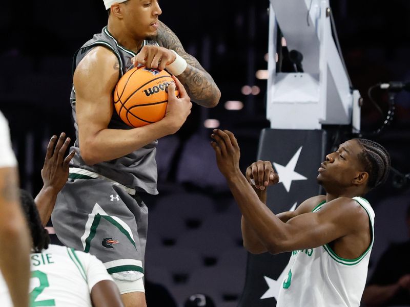 Mar 15, 2025; Fort Worth, TX, USA;  UAB Blazers forward Yaxel Lendeborg (3) grabs a rebound against North Texas Mean Green forward Brenen Lorient (6) during the first half at Dickies Arena. Mandatory Credit: Chris Jones-Imagn Images