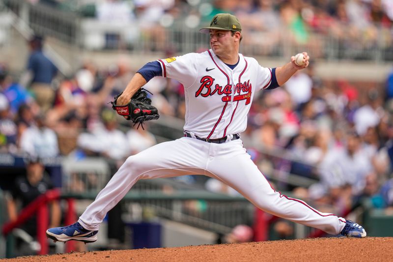 May 21, 2023; Cumberland, Georgia, USA; Atlanta Braves starting pitcher Jared Shuster (45) pitches against the Seattle Mariners during the second inning at Truist Park. Mandatory Credit: Dale Zanine-USA TODAY Sports