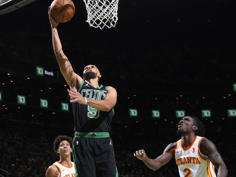 BOSTON, MA - NOVEMBER 12: Derrick White #9 of the Boston Celtics drives to the basket during the game against the Atlanta Hawks during the Emirates NBA Cup game on November 12, 2024 at TD Garden in Boston, Massachusetts. NOTE TO USER: User expressly acknowledges and agrees that, by downloading and/or using this Photograph, user is consenting to the terms and conditions of the Getty Images License Agreement. Mandatory Copyright Notice: Copyright 2024 NBAE (Photo by Brian Babineau/NBAE via Getty Images)