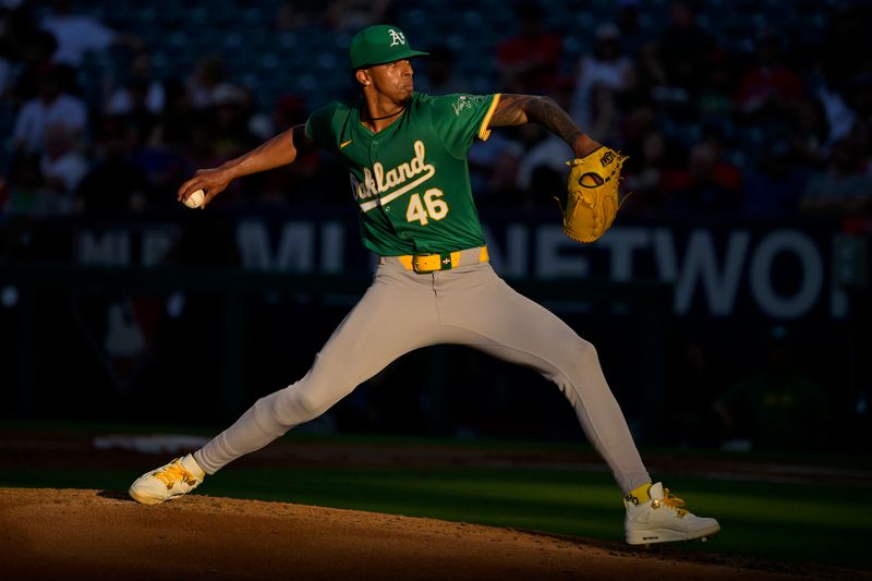 Jun 24, 2024; Anaheim, California, USA;  Oakland Athletics starting pitcher Luis Medina (46) delivers to the plate in the second inning against the Los Angeles Angels at Angel Stadium. Mandatory Credit: Jayne Kamin-Oncea-USA TODAY Sports