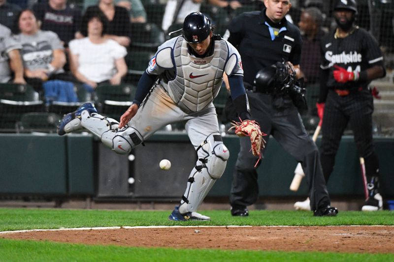 Sep 9, 2024; Chicago, Illinois, USA;  Cleveland Guardians catcher Bo Naylor (23) can not catch a foul ball during the eighth inning against the Chicago White Sox at Guaranteed Rate Field. Mandatory Credit: Matt Marton-Imagn Images