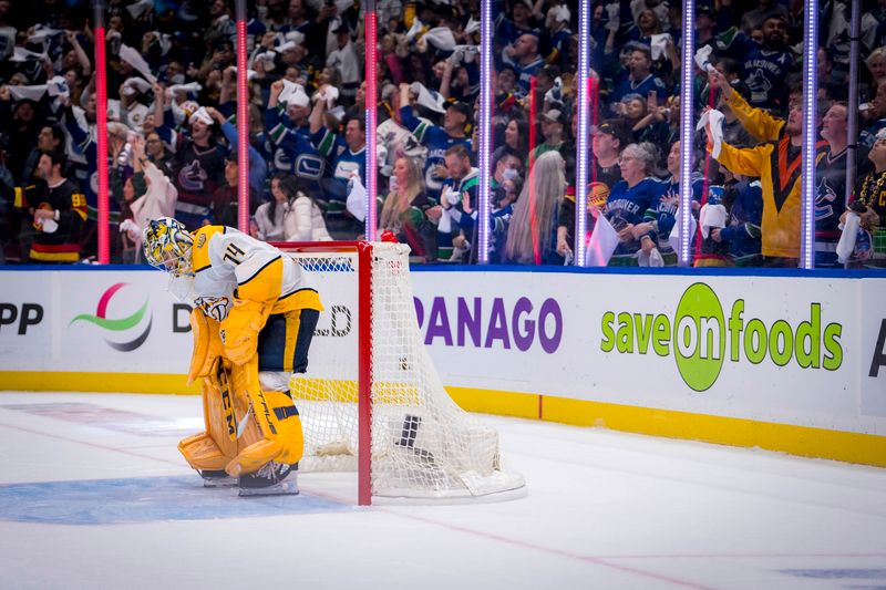 Apr 21, 2024; Vancouver, British Columbia, CAN; Nashville Predators goalie Juuse Saros (74) reacts after Vancouver Canucks forward Dakota Joshua (81) scored an empty net goal in the third period in game one of the first round of the 2024 Stanley Cup Playoffs at Rogers Arena.  Mandatory Credit: Bob Frid-USA TODAY Sports