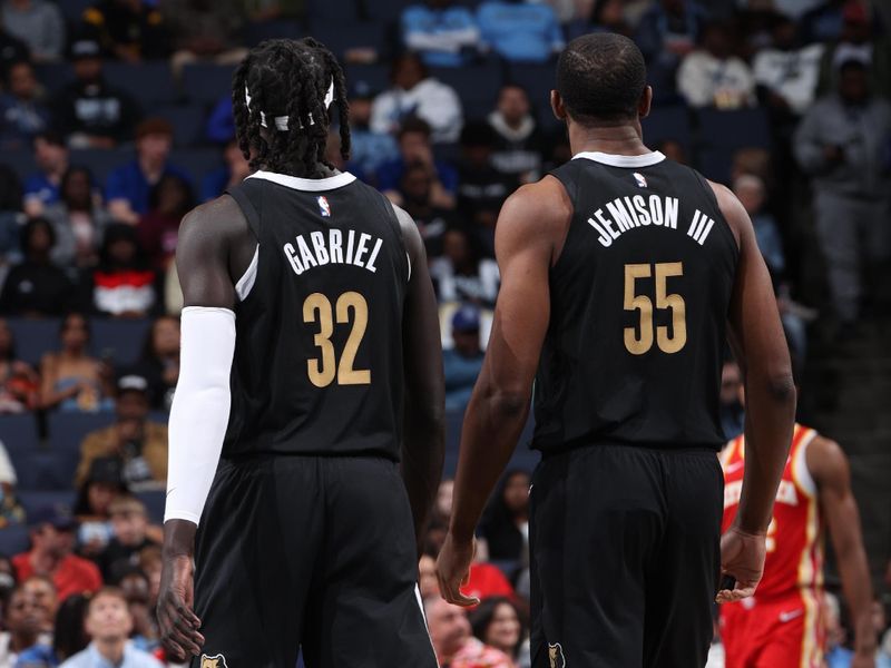 MEMPHIS, TN - MARCH 8: Trey Jemison #55 and Wenyen Gabriel #32 of the Memphis Grizzlies look on during the game against the Atlanta Hawks on March 8, 2024 at FedExForum in Memphis, Tennessee. NOTE TO USER: User expressly acknowledges and agrees that, by downloading and or using this photograph, User is consenting to the terms and conditions of the Getty Images License Agreement. Mandatory Copyright Notice: Copyright 2024 NBAE (Photo by Joe Murphy/NBAE via Getty Images)