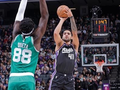 SACRAMENTO, CA - DECEMBER 20:  Trey Lyles #41 of the Sacramento Kings shoots a three point basket during the game  on December 20, 2023 at Golden 1 Center in Sacramento, California. NOTE TO USER: User expressly acknowledges and agrees that, by downloading and or using this Photograph, user is consenting to the terms and conditions of the Getty Images License Agreement. Mandatory Copyright Notice: Copyright 2023 NBAE (Photo by Rocky Widner/NBAE via Getty Images)