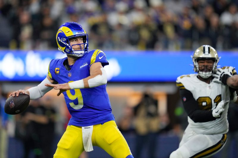 Los Angeles Rams quarterback Matthew Stafford (9) throws a pass against the New Orleans Saints during the second half of an NFL football game Thursday, Dec. 21, 2023, in Inglewood, Calif. (AP Photo/Ashley Landis)