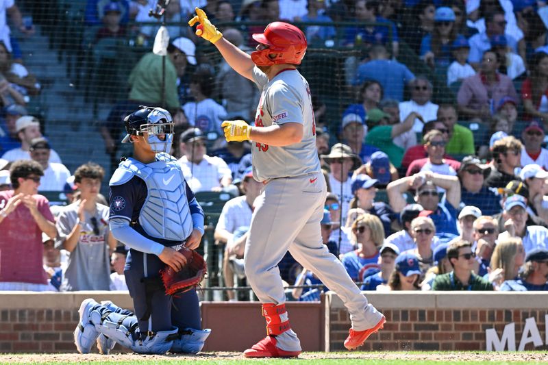 Jun 14, 2024; Chicago, Illinois, USA;  St. Louis Cardinals catcher Pedro Pages (43) points after he hits a home run during the eighth inning against the Chicago Cubs  at Wrigley Field. Mandatory Credit: Matt Marton-USA TODAY Sports