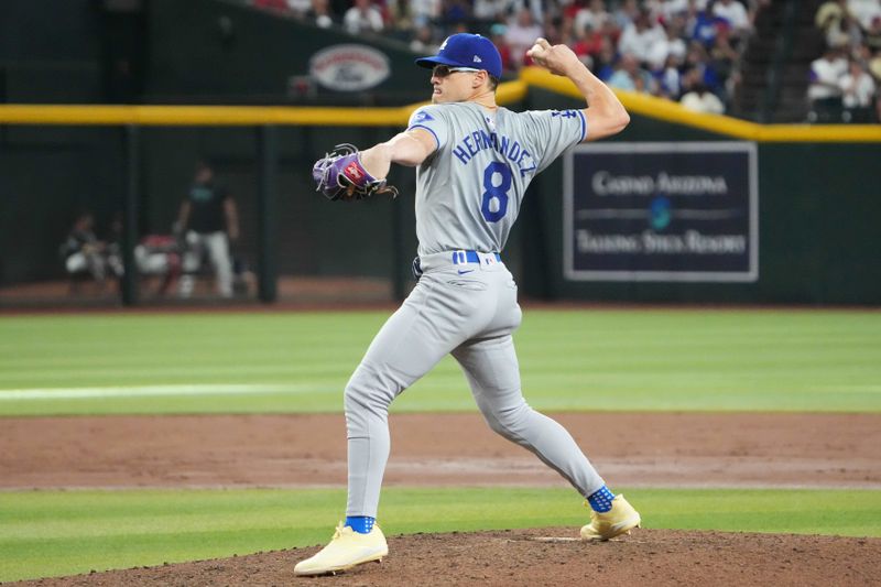 Sep 1, 2024; Phoenix, Arizona, USA; Los Angeles Dodgers third base Enrique Hernández (8) pitches against the Arizona Diamondbacks during the eighth inning at Chase Field. Mandatory Credit: Joe Camporeale-USA TODAY Sports